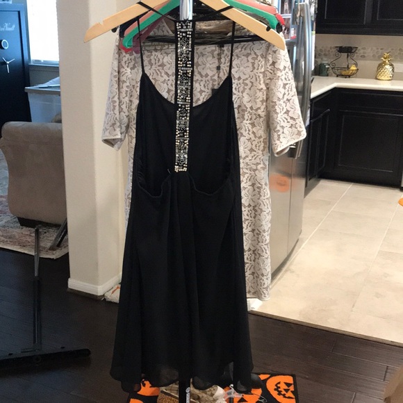 Black mini dress with embellishment in back - Picture 1 of 4